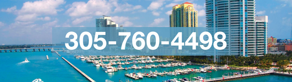 Photo of Miami harbor in mid summer with attached phone number of Miami Boat Repair shop.